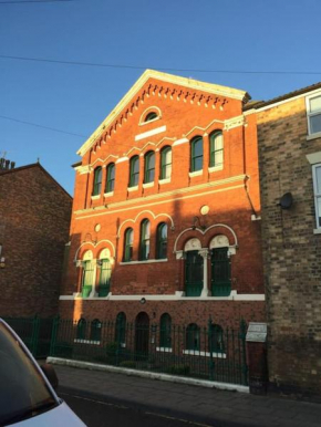converted chapel filey floor to ceiling arch window